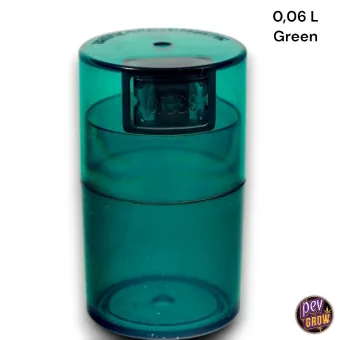 Bote Tight Vac verde translúcido, de forma cilíndrica, con tapa colocada y mecanismo rectangular oscuro en la parte superior. Bote Tight Vac verde translúcido, de forma cilíndrica, con tapa colocada y mecanismo rectangular oscuro en la parte superior.