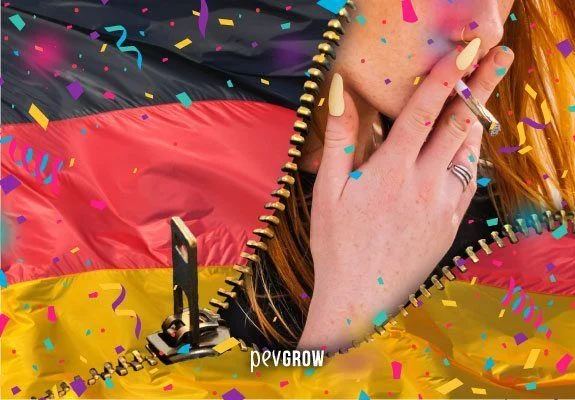 Primer plano de una persona con un cigarrillo junto a los labios, enmarcada por una cremallera con los colores de Alemania y confeti. Primer plano de una persona con un cigarrillo junto a los labios, enmarcada por una cremallera con los colores de Alemania y confeti.