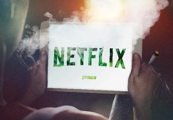 Manos sostienen una tableta con el texto NETFLIX en verde, entre humo, mientras una de ellas sujeta un cigarrillo encendido. Manos sostienen una tableta con el texto NETFLIX en verde, entre humo, mientras una de ellas sujeta un cigarrillo encendido.