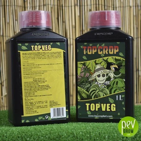 Dos envases de Top Veg de Top Crop con tapones rosas muestran sus etiquetas frontal y trasera ante un fondo de cañas.