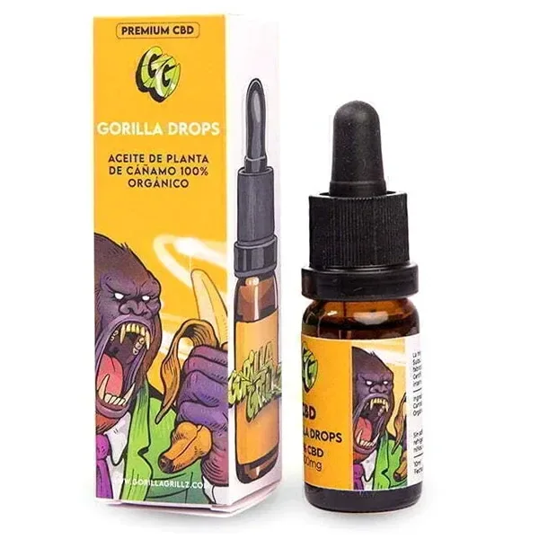 Aceite CBD Gorilla Drops de Gorilla Grillz en frasco ámbar con cuentagotas negro y caja amarilla ilustrada con un gorila.