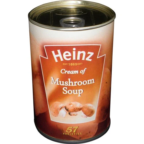 Bote de camuflaje con apariencia de conserva Heinz de crema de champiñones, etiqueta anaranjada y tapa metálica con anilla.