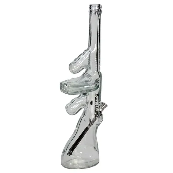 Bong de cristal Shooter transparente con silueta de arma, cuello largo, base ensanchada y cazoleta lateral sobre fondo blanco.