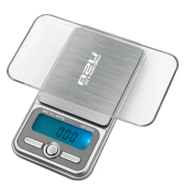 Báscula digital USA Weight Las Vegas 200 en diagonal, con tapa transparente abierta, plataforma plateada y pantalla azul que marca 0.00.