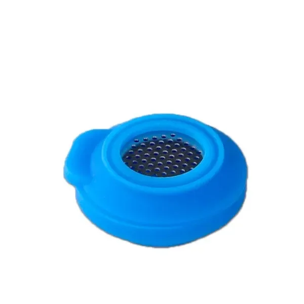 Rejilla completa Fenix Mini vista en perspectiva, con cuerpo circular azul, pestaña lateral y disco central perforado.