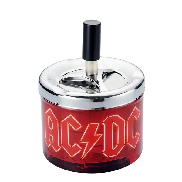 Cenicero cilíndrico rojo con logotipo AC/DC, tapa metálica brillante y pulsador central negro, sobre fondo blanco.