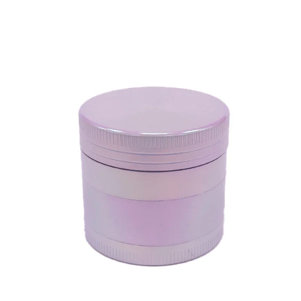 Grinder Pearl cilíndrico de color lila claro, cerrado, con varias secciones y bordes estriados sobre fondo blanco.