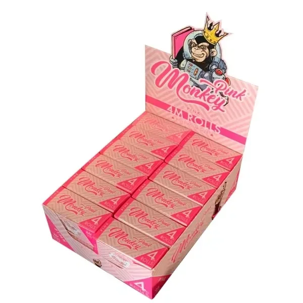 Expositor rosa de papel Monkey King Rolls Pink con varias cajas y un mono coronado en la cabecera, sobre fondo blanco.