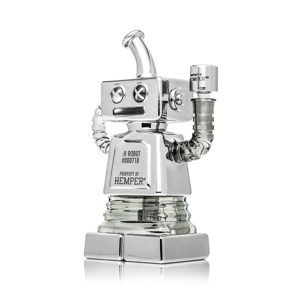 Bong Hemper Hi-Robot XL con forma de robot plateado, ojos en aspa, boquilla curva y brazo elevado que sostiene la cazoleta.