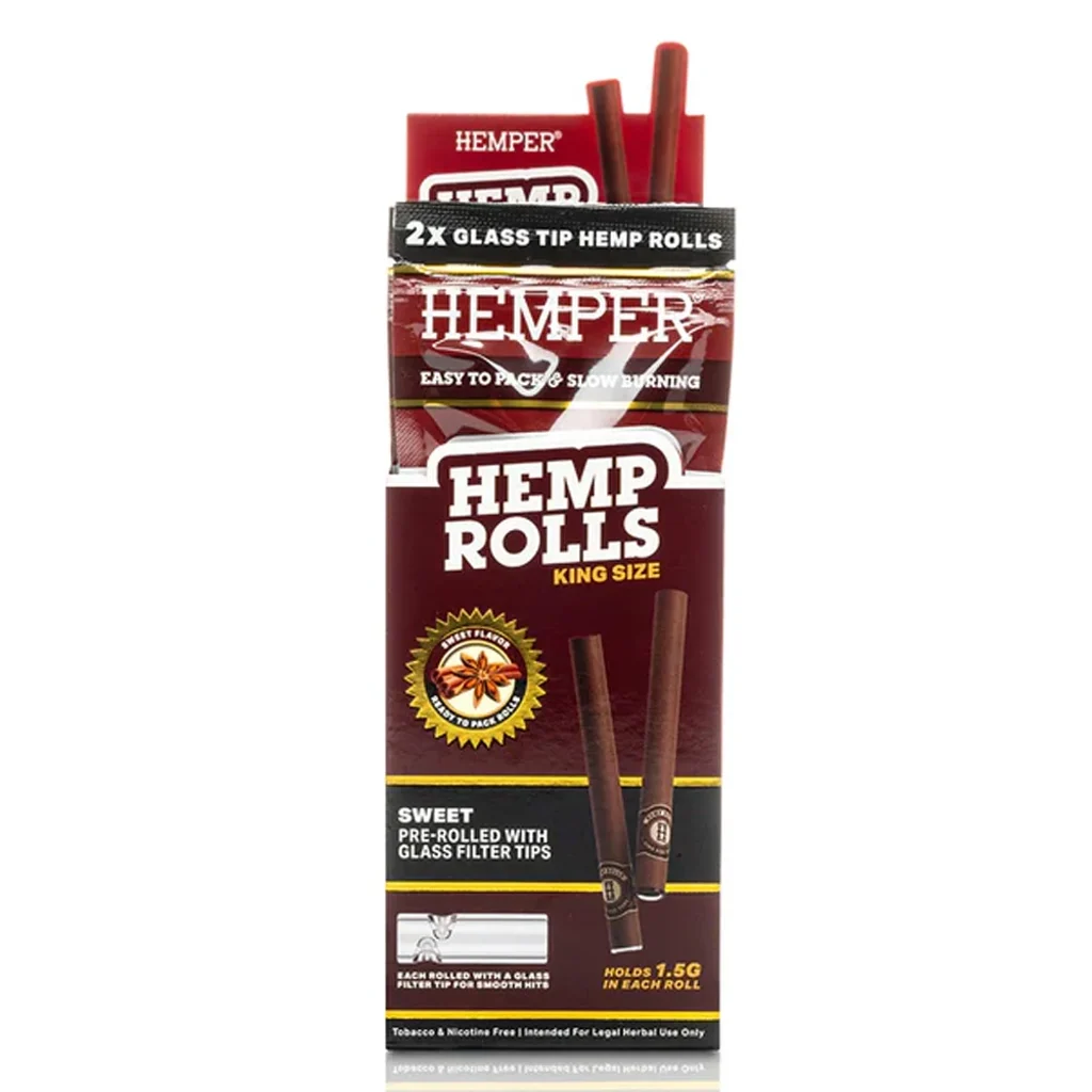 Envase granate HEMPER Hemp Rolls King Size Sweet con texto sobre filtros de vidrio y conos marrones que sobresalen por arriba.