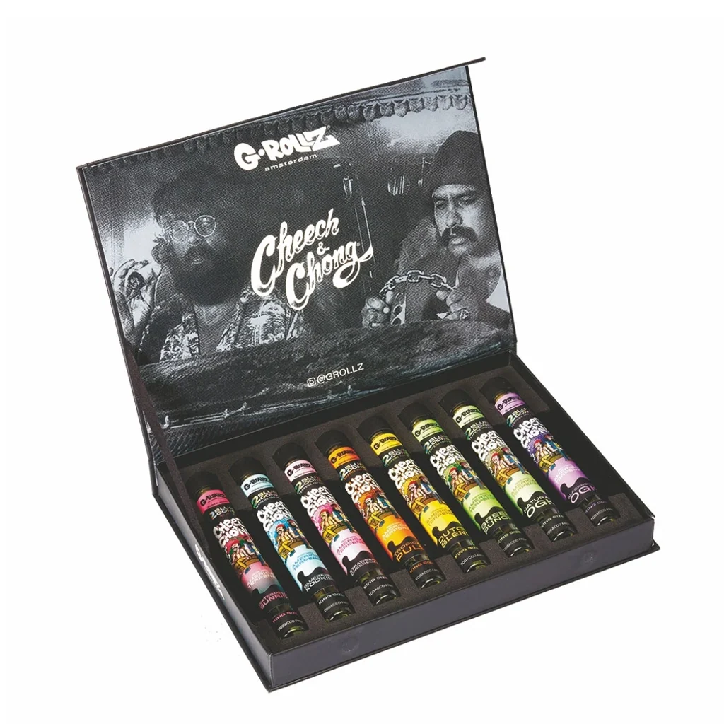 Caja regalo G-Rollz abierta, con retratos de Cheech & Chong en el interior de la tapa y varios tubos con etiquetas de colores.