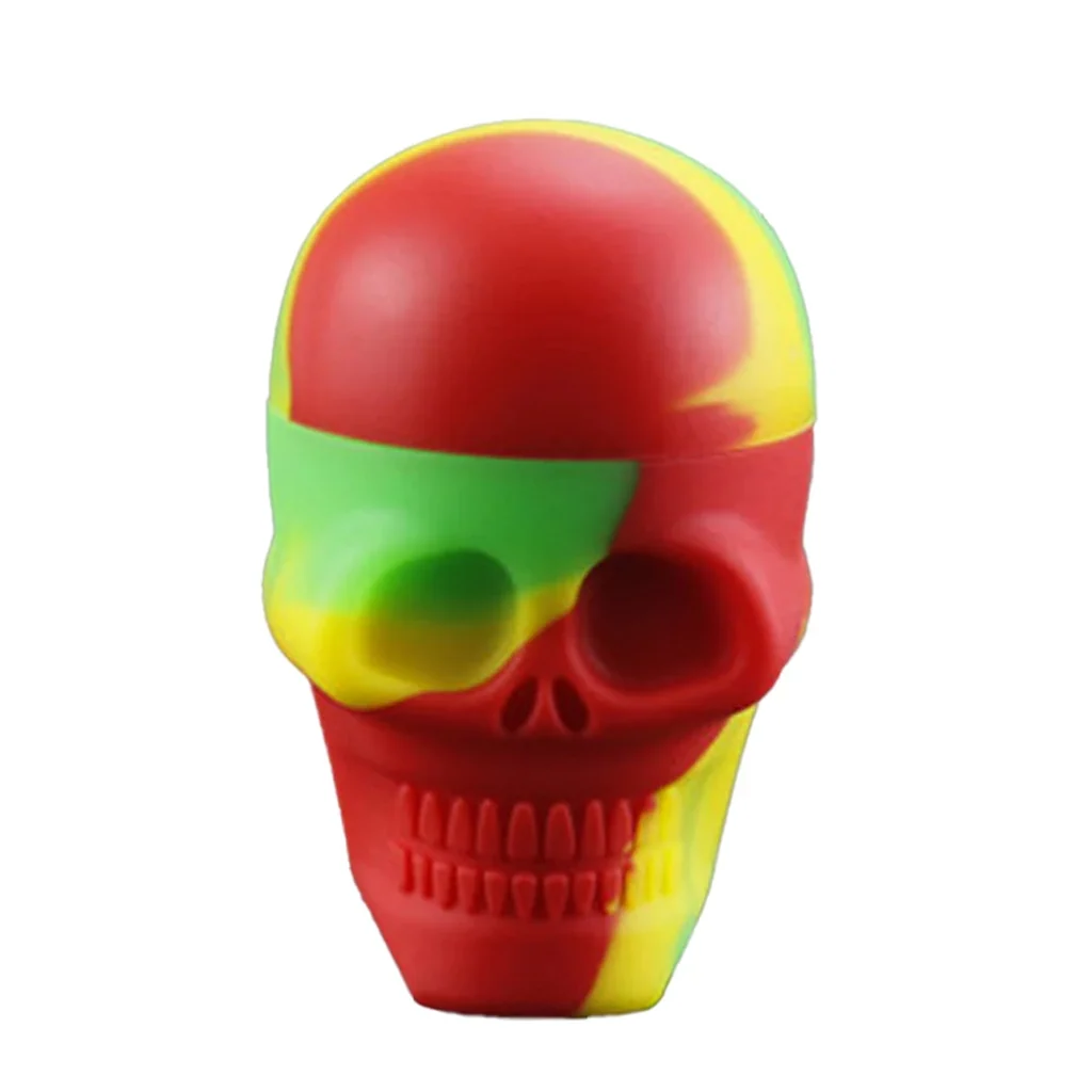 Bote de silicona Rasta de Easy Garden Smokers con forma de calavera, visto de frente, con zonas rojas, amarillas y verdes.