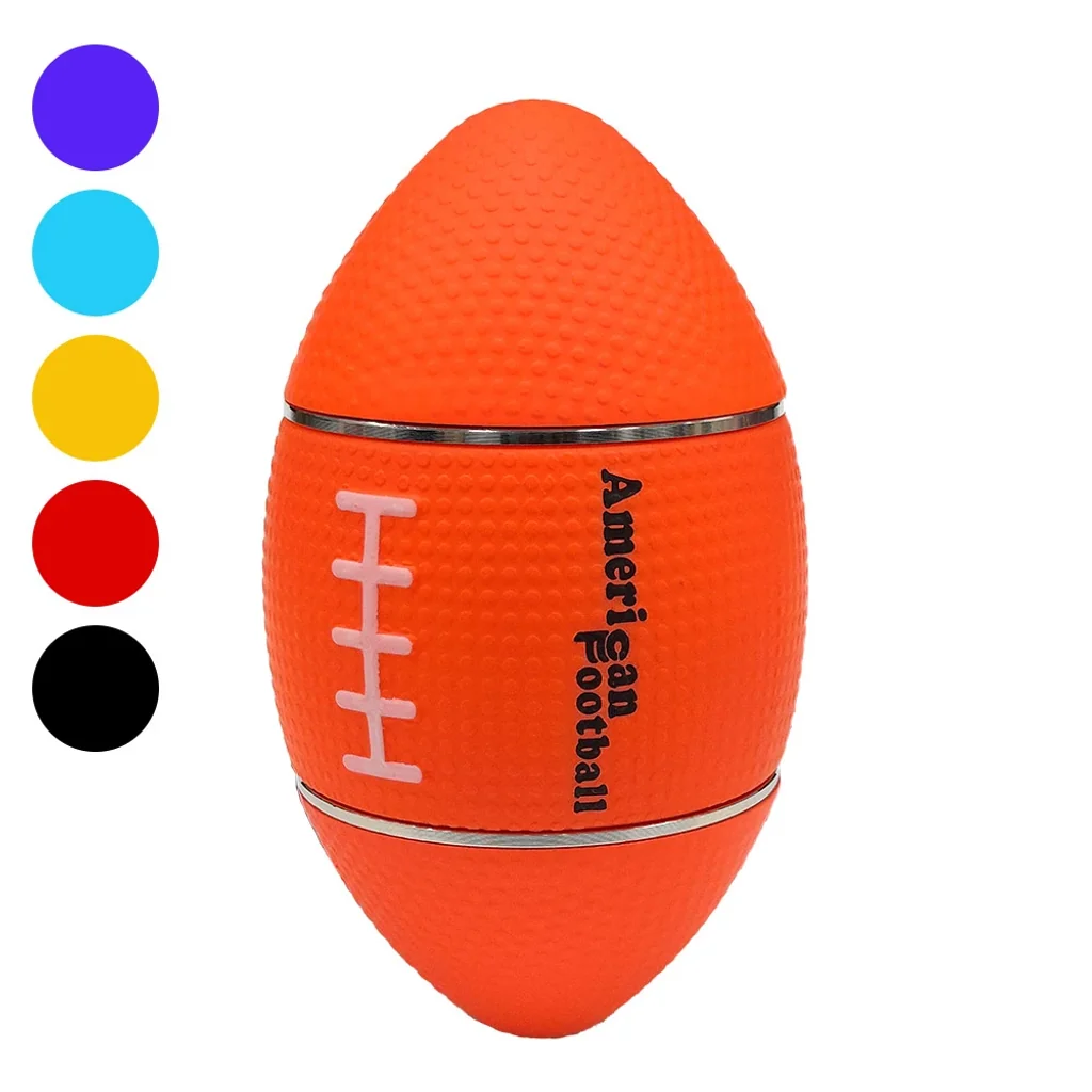 Grinder Rugby naranja con forma de balón, superficie texturizada, costuras blancas y bandas plateadas, junto a muestras de otros colores.
