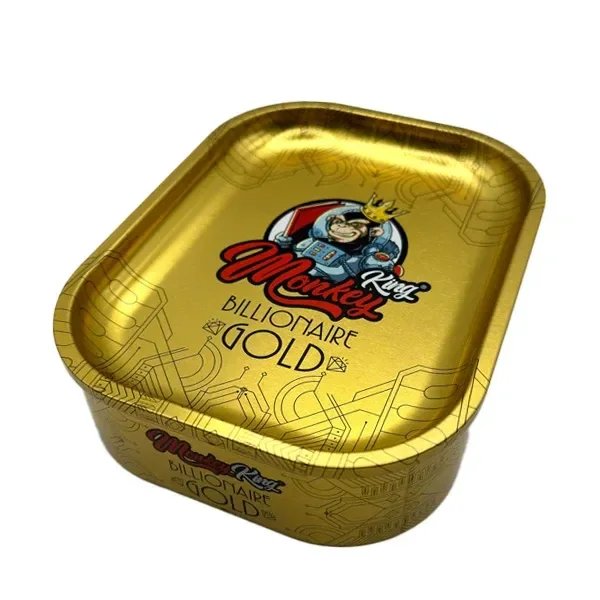 Caja dorada con bandeja superior de bordes redondeados, dibujo de un mono coronado y texto Monkey King Billionaire Gold.