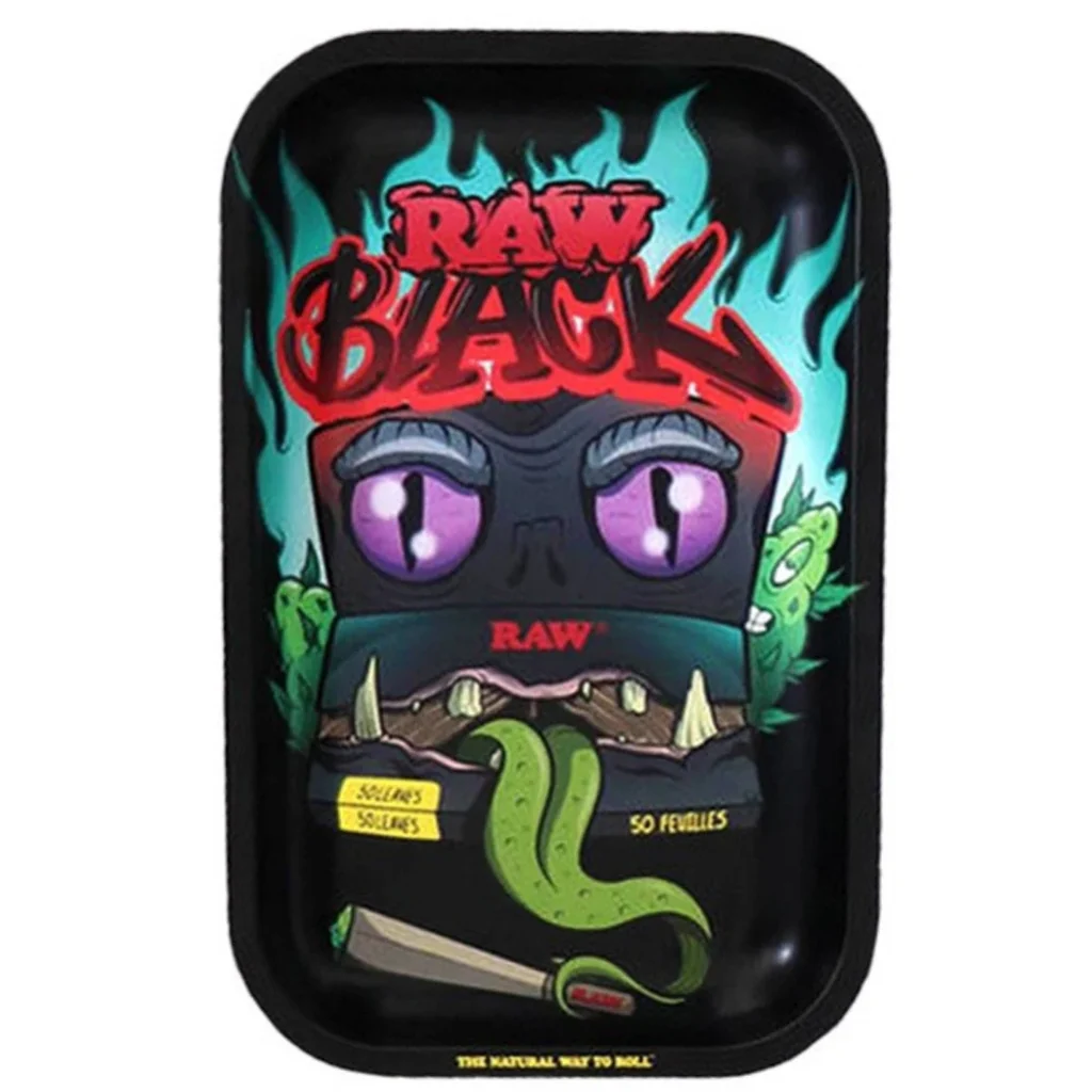 Bandeja negra RAW Black con bordes elevados y un monstruo de ojos morados, lengua verde y llamas turquesas.
