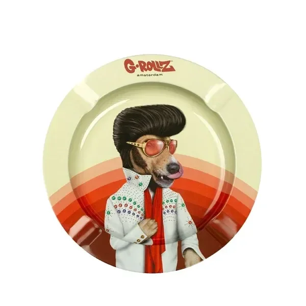 Cenicero redondo G-Rollz con un perro de tupé negro, gafas rojizas y traje blanco, sobre franjas curvas naranjas y rojas.