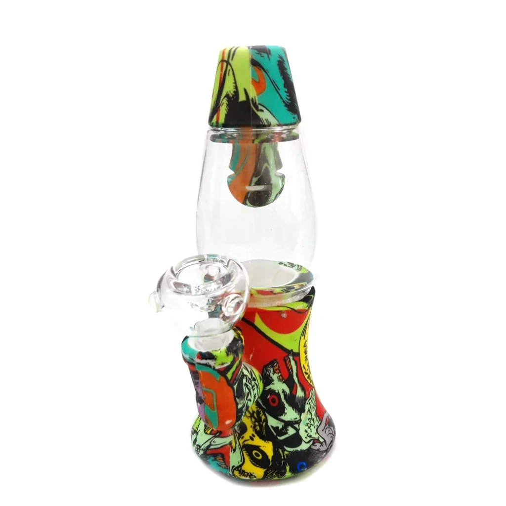 Bong con cámara transparente, base y boquilla de estampado multicolor con calaveras, y cazoleta transparente lateral.