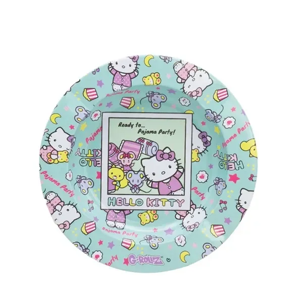 Cenicero redondo Hello Kitty Pajama Party de G-ROLLZ, verde claro con personajes en pijama, lunas y estrellas de colores.