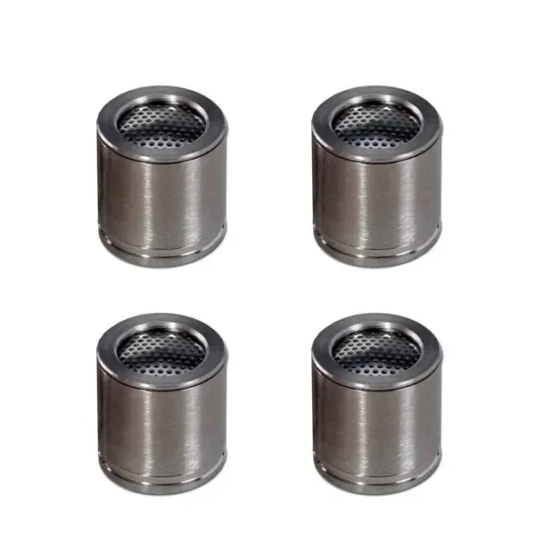 Cápsulas de dosificación Fenix Mini, cilíndricas y plateadas, con superficies superiores perforadas, dispuestas sobre fondo blanco.