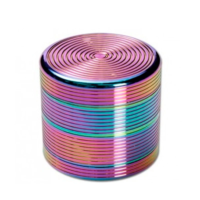 Grinder Spiral Rainbow cilíndrico con acabado multicolor iridiscente, estrías laterales y relieve en espiral en la tapa.