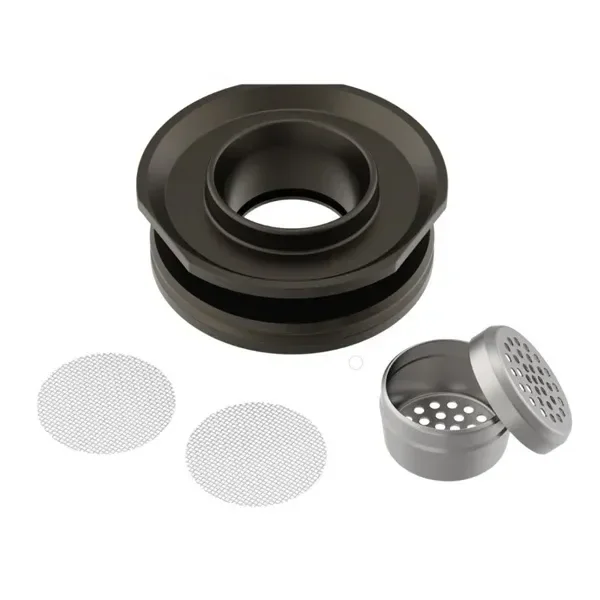 Cámara reductora Volcano Hybrid con cuerpo circular oscuro, cápsula metálica abierta con tapa perforada y mallas circulares separadas.