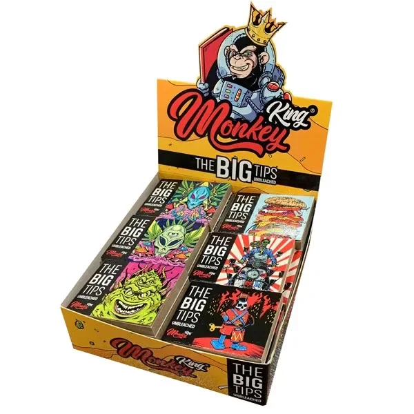 Expositor Monkey King Big Tips Unbleached con librillos de diseños multicolores y un mono coronado en el cartel superior.