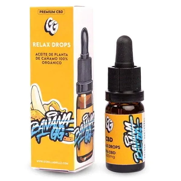 Frasco ámbar con cuentagotas negro de Relax Drops Banana GG, junto a su caja amarilla con ilustraciones de plátanos.