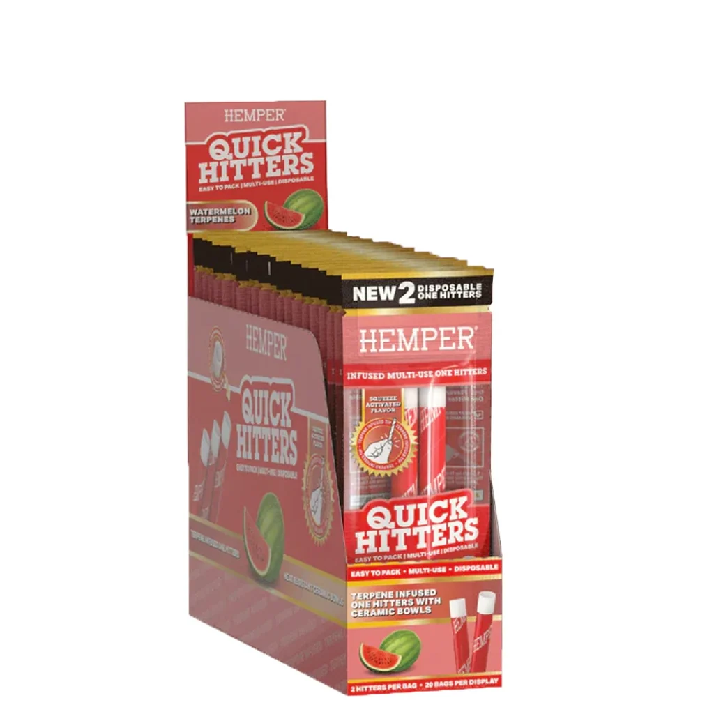 Expositor rojo de pipas One Hitter Quick Hitters de Hemper, con varios sobres y dibujos de sandía en el embalaje.
