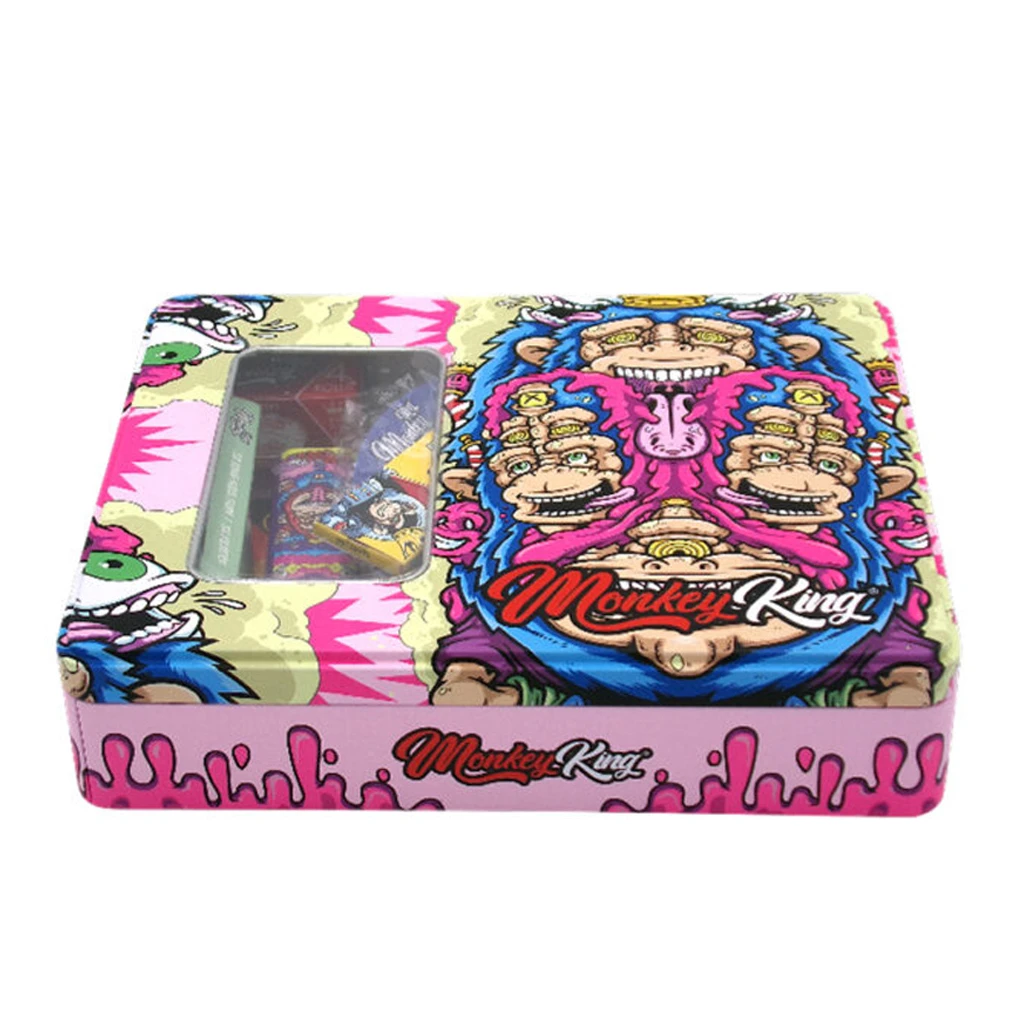 Caja Monkey King Try Kit Pink con ventana en la tapa y dibujos de monos en rosa y azul sobre fondo amarillo claro.