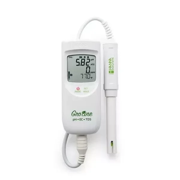 Medidor portátil Hanna GroLine blanco, con pantalla digital de pH, ppm y temperatura, acompañado de una sonda conectada por cable.
