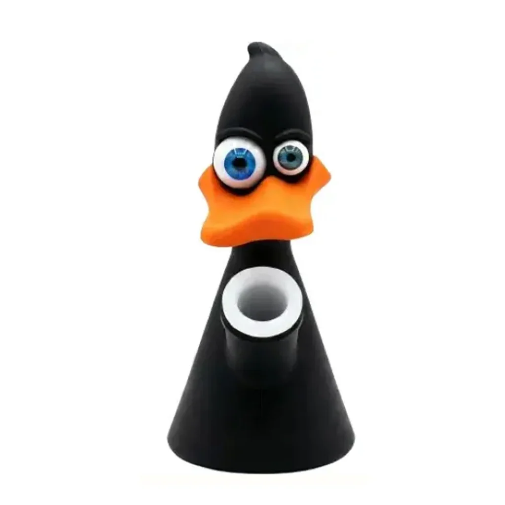 Bong Lucas con forma de pato negro, ojos azules de distinto tamaño, pico naranja y cazoleta frontal de borde blanco sobre una base cónica.