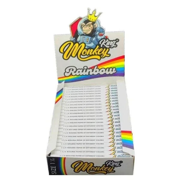 Expositor abierto de papel Monkey King Rainbow 1 1/4, con varios libritos blancos y franjas con los colores del arcoíris.
