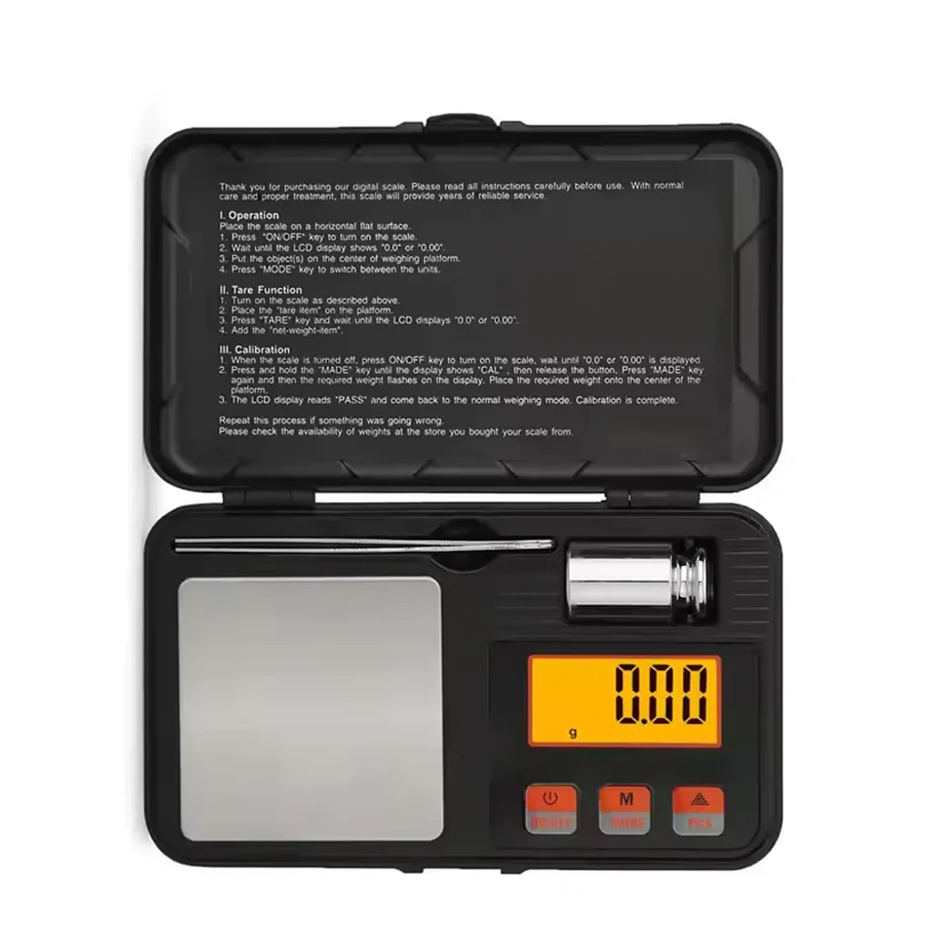Báscula digital Easy Garden Calibra 200 abierta, con plataforma metálica, pantalla naranja a cero, pinzas y pesa.
