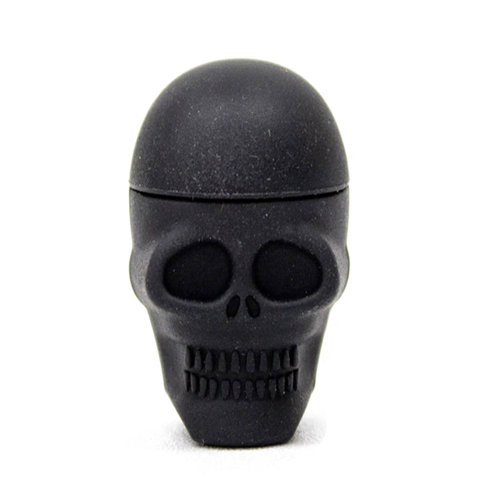 Bote Black Skull negro con forma de calavera, tapa redondeada y relieves de ojos, nariz y dientes, visto de frente sobre fondo blanco.
