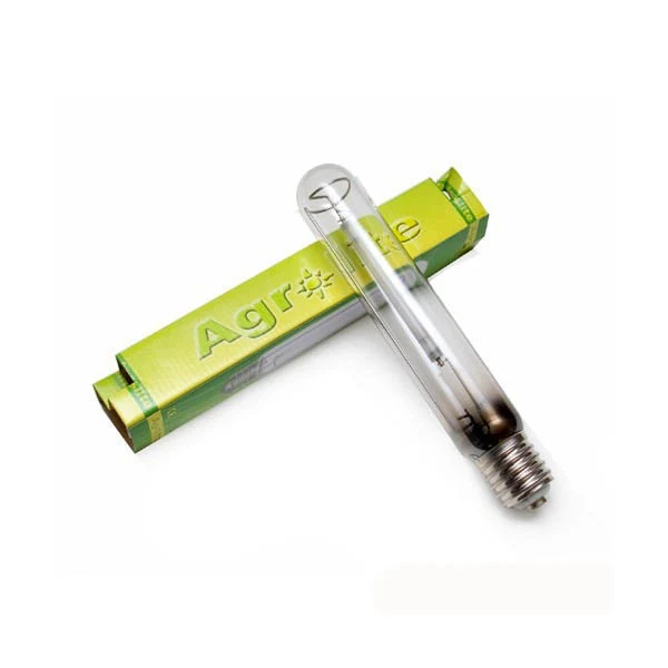 Lámpara Agrolite SHP Mixta de bulbo tubular transparente y casquillo de rosca, cruzada sobre su caja verde en fondo blanco.