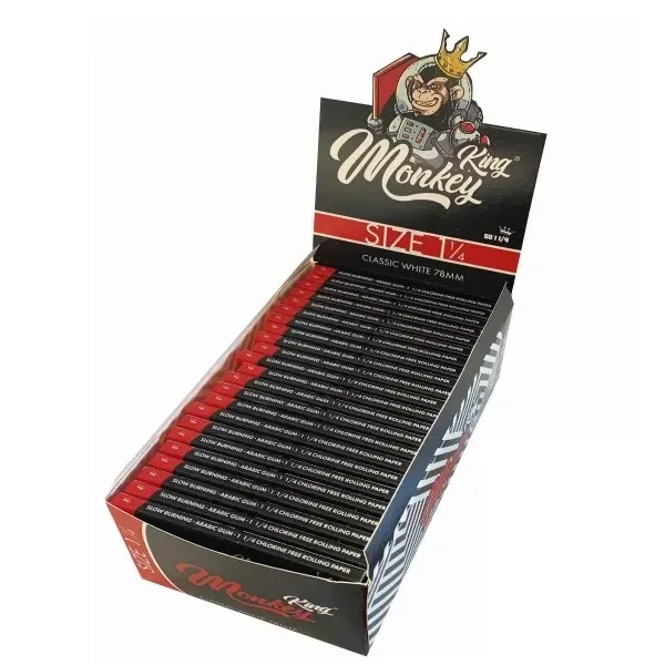 Expositor abierto de papel Monkey King con libritos negros y rojos, formato 1¼ y texto Classic White 78 mm.