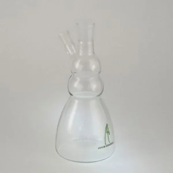 Cuerpo transparente De Verdamper Deluxe Small, con base ensanchada, cuello de formas redondeadas y abertura lateral inclinada. Cuerpo transparente De Verdamper Deluxe Small, con base ensanchada, cuello de formas redondeadas y abertura lateral inclinada.