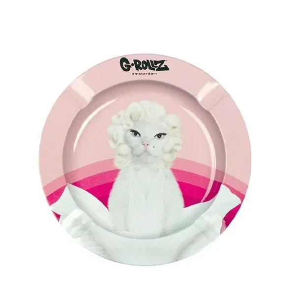 Cenicero rosa G-Rollz Pets Rock Diamond visto desde arriba, con un gato blanco de cabello ondulado y vestido blanco sobre franjas rosas.