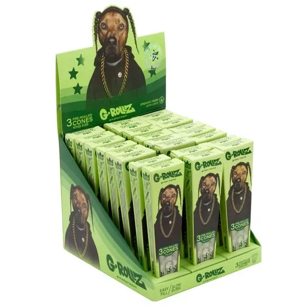 Expositor verde de conos G-Rollz King Size con varios envases ilustrados con un perro que lleva cadenas doradas.