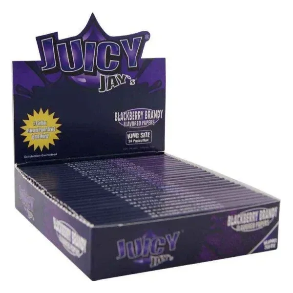 Expositor morado abierto de papel Juicy Jay's King Size Blackberry Brandy, con varios libritos alineados sobre fondo blanco.