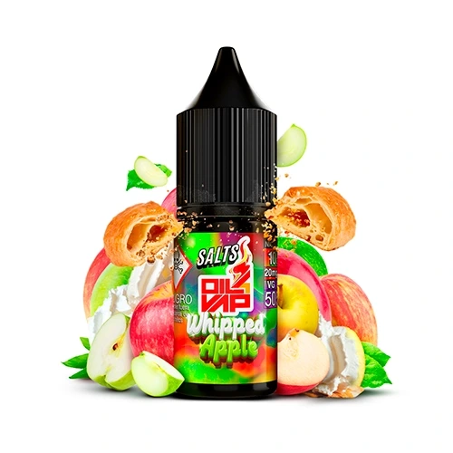 Frasco Oil4Vap Whipped Apple Salts con tapón negro, rodeado de manzanas enteras y cortadas, hojaldres y crema blanca.