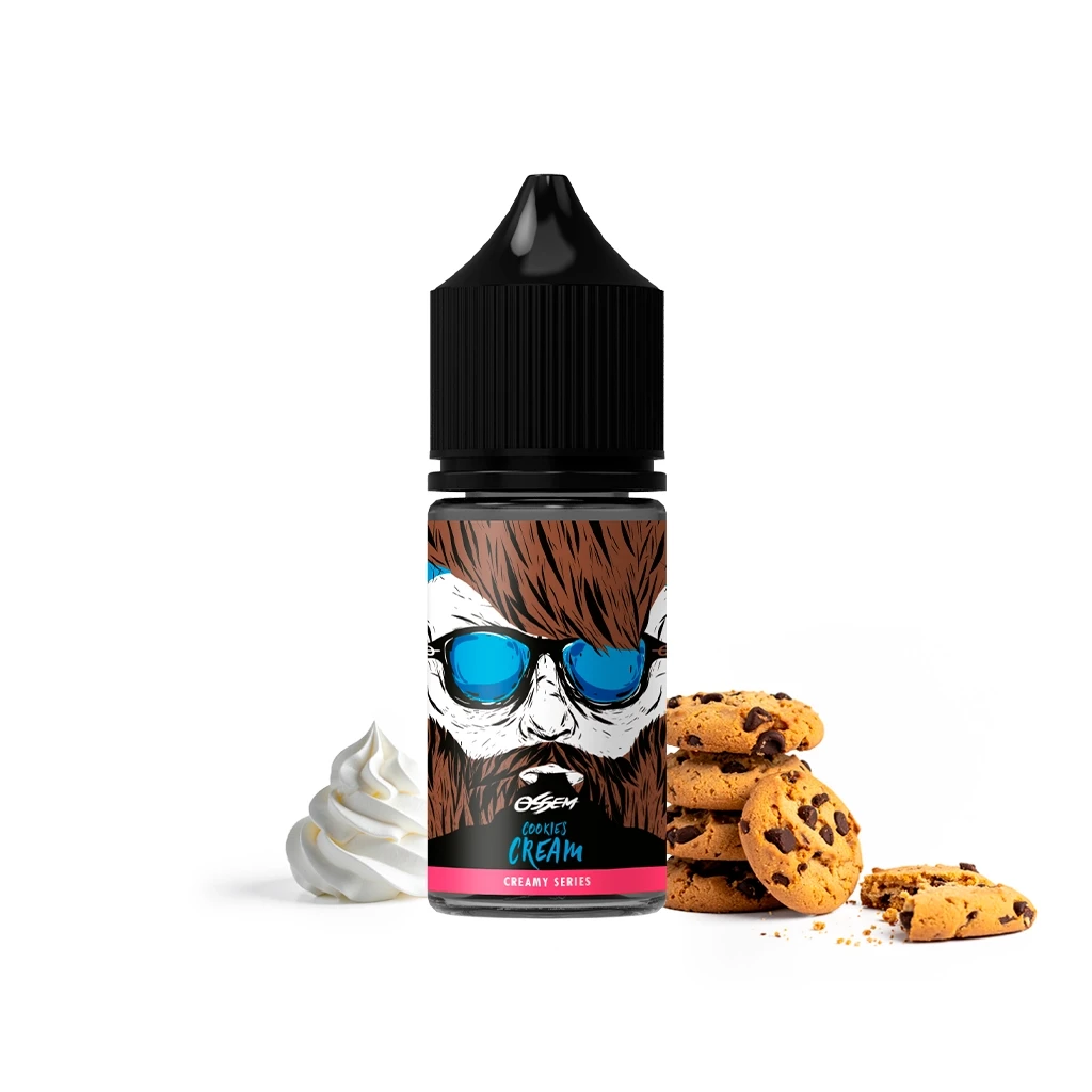 Frasco Ossem Cookies and Cream con tapón negro y etiqueta de rostro con gafas azules, rodeado de galletas y una porción de crema blanca.