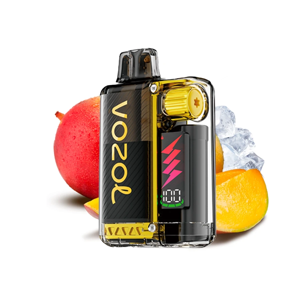 Vozol Vista Plug 2+10 Mango Ice con carcasa transparente, detalles amarillos y pantalla frontal, junto a mango y cubitos de hielo. Vozol Vista Plug 2+10 Mango Ice con carcasa transparente, detalles amarillos y pantalla frontal, junto a mango y cubitos de hielo.
