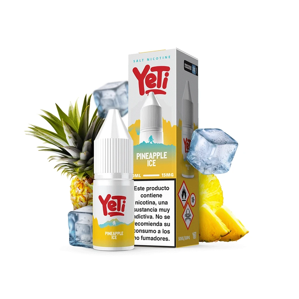 Frasco y caja de Yeti Pineapple Ice, con etiquetas blancas y amarillas, junto a una piña, rodajas y cubitos de hielo.