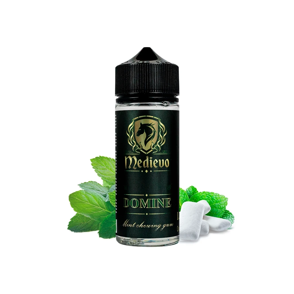 Frasco de Medievo Domine Longfill con tapón negro y etiqueta negra y dorada, junto a hojas de menta y piezas blancas de chicle.