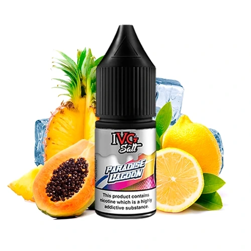 Bote de IVG Salts Paradise Lagoon con tapón negro, rodeado de piña, papaya, limón y cubitos de hielo sobre fondo blanco.