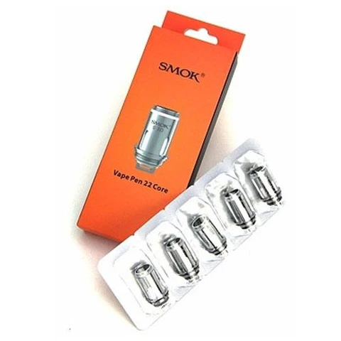 Caja naranja SMOK Vape Pen 22 Core junto a un blíster con cinco resistencias plateadas, dispuestos en diagonal sobre fondo blanco.