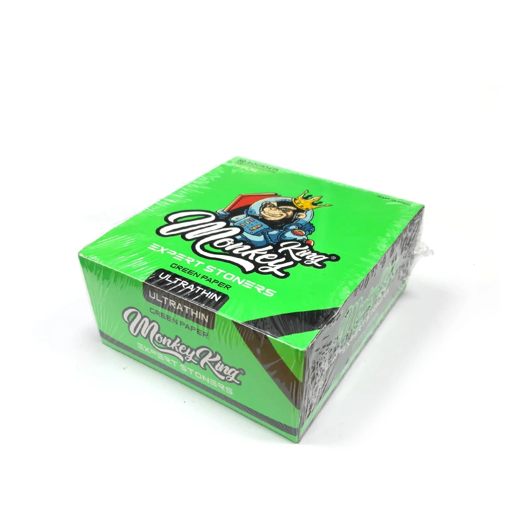 Caja verde de papel Monkey King, vista en perspectiva y envuelta en plástico, con un mono coronado y el texto Ultrathin Green Paper.