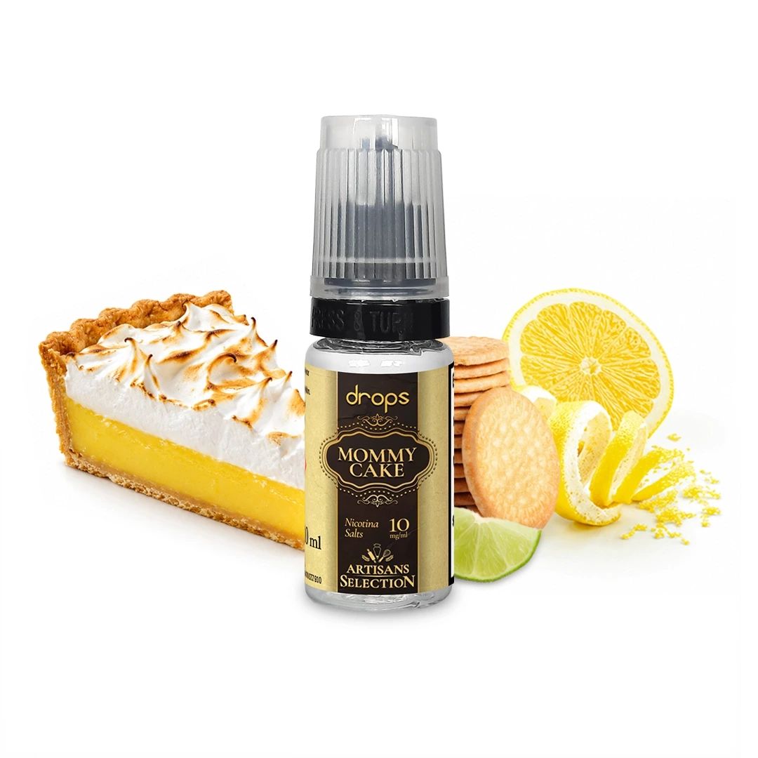 Frasco Drops Mommy Cake con etiqueta negra y dorada, junto a una porción de tarta con merengue, galletas y cítricos.
