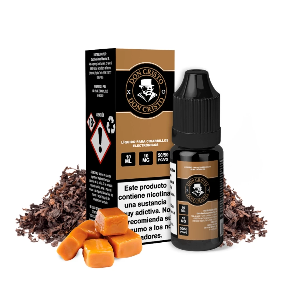Frasco y caja de Don Cristo XO Salts de 10 ml, con etiquetas negras y doradas, junto a hojas de tabaco y dados de caramelo.